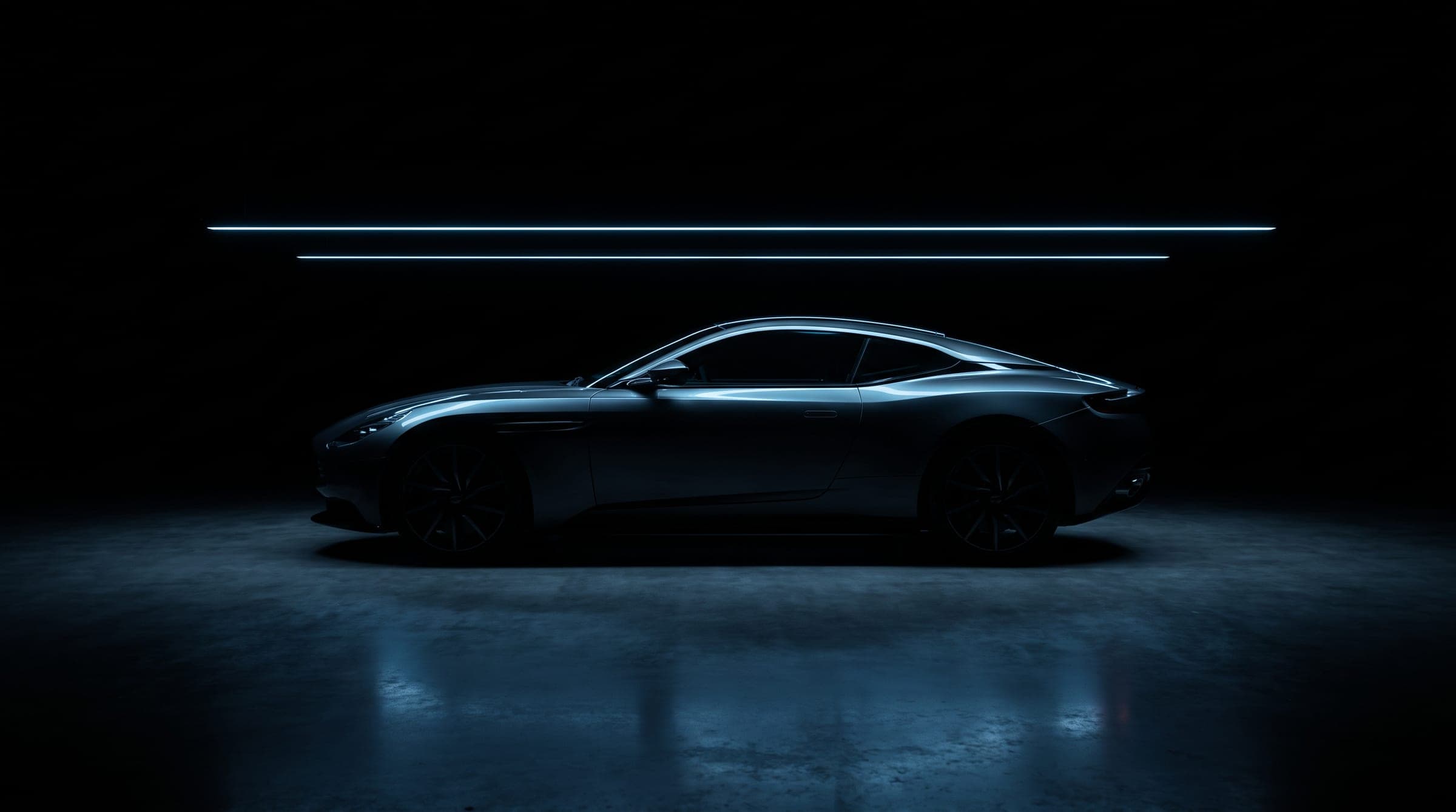 Nocturne EV concept: an unbadged electric coupé in profile, revealed by a single line of light